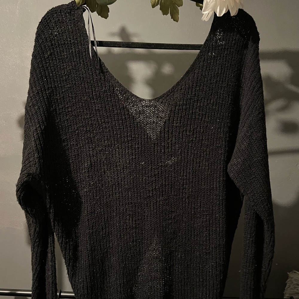 Black knitted sweater w/ crossed back